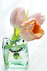 Cut tulips in a decorative glass vase with a pendant Poster Print by Lorna Rande / Design Pics - Item # VARDPI12524354