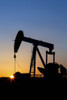 Silhouette of a pumpjack at sunrise with orange sunburst; Acme, Alberta, Canada Poster Print by Michael Interisano / Design Pics - Item # VARDPI12540881