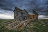 Abandoned house on the prairies with storm clouds overhead at sunset; Val Marie, Saskatchewan, Canada Poster Print by Robert Postma / Design Pics - Item # VARDPI12512241