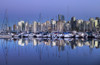 Skyline and harbour of Vancouver at twilight with reflections in the water; Vancouver, British Columbia, Canada Poster Print by Lorna Rande / Design Pics - Item # VARDPI12509791