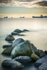 Ships out in the Pacific ocean off the coast of Stanley Park with rocks in the foreground; Vancouver, British Columbia, Canada Poster Print by Aaron Von Hagen / Design Pics - Item # VARDPI12515832