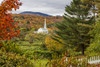 Stowe Church surrounded by lush and autumn coloured foliage with forest on the hillside; Stowe, Vermont, United States of America Poster Print by Jenna Szerlag / Design Pics - Item # VARDPI12509814