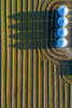 View from directly above of four large metal grain bins and canola harvest lines at sunset with long shadows; Alberta, Canada Poster Print by Michael Interisano / Design Pics - Item # VARDPI12516670
