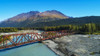 An aerial scenic of the Alaskan Railroad trestle crossing the Snow River on a sunny summer day in South-central Alaska; Alaska, United States of America Poster Print by Michael Jones / Design Pics - Item # VARDPI12546650