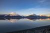 Turnagain Arm, South of Anchorage, Alaska in the morning. Ocean waters are calm and provides a good reflection of the mountains in the water; Alaska, United States of America Poster Print by Doug Lindstrand / Design Pics - Item # VARDPI12554462