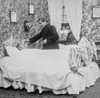 Magic lantern slide circa 1900VictorianSocial History Image from a slide presentation entitled In His step or In jesus Name A sick man in his bed wioth the ministertalking to him before he dies Poster by John Short - Item # VARDPI12513244