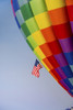 Hot air balloon bringing color to the sky. Poster Print by Larry Ditto - Item # VARPDDUS32LDI0186