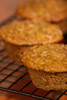 Freshly baked zucchini muffins cooling on a wire rack Poster Print by Janet Horton (18 x 24) # US48JHO1385