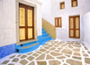 Greece, Symi. Doors to courtyard and stairway of house.  Poster Print by Jaynes Gallery - Item # VARPDDEU12BJY0012