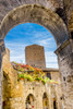 Medieval stone arch and tower, San Gimignano, Tuscany, Italy Poster Print by William Perry (18 x 24) # EU16WPE0721