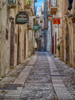 Italy, Apulia, Foggia, Vieste A picturesque alley in Vieste old town Poster Print by Julie Eggers (18 x 24) # EU16JEG0648