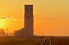 Canada, Manitoba, Culross. Grain elevator and railroad tracks at sunrise. Poster Print by Jaynes Gallery - Item # VARPDDCN03BJY0441