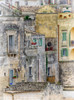 Italy, Basilicata, Matera Balconies and windows of sassi homes in the old town of Matera Poster Print by Julie Eggers (18 x 24) # EU16JEG0862