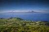 Portugal, Azores, Sao Jorge Island, Pico da Velha. Elevated view of fields and Pico Volcano Poster Print by Walter Bibikow - Item # VARPDDEU23WBI1051
