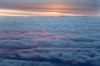 Sunrise from an airliner looking down at clouds Credit as: Dennis Flaherty / Jaynes Gallery Poster Print by Jaynes Gallery (24 x 18) # AU03BJY0000