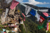 Bhutan, Paro Prayer flags fluttering at the cliff's edge across from Taktsang Monastery, or Tiger's Nest Poster Print by Brenda Tharp (24 x 18) # AS04BTH0097