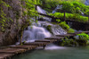 Croatia, Plitvice Lakes National Park Scenic of waterfall and wooden walkway Credit as: Jim Nilsen / Jaynes Gallery Poster Print by Jaynes Gallery (24 x 18) # EU32BJY0184