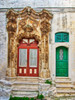 Italy, Puglia, Brindisi, Itria Valley, Ostuni Green door and a red door surrounded by very ornate carvings along the streets and alleyways of old town Ostuni Poster Print by Julie Eggers (18 x 24) # EU16JEG0676