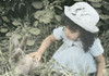Girl and Bunny Poster Print by Unknown Unknown # F101630