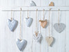 Hearts hanging on wooden background Poster Print by Assaf Frank # AF20141123055