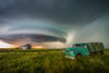 Vintage truck on farmland under a dramatic stormy sky; Moose Jaw, Saskatchewan, Canada Poster Print by Michael St Laurent (19 x 12) # 12575665