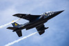 The 1981 DORNIER GMBH ALPHA-JET trailing smoke while performing aerobatic manoeuvres in the 2019 Olympic Air Show, Olympic Airport; Olympia, Washington, United States of America Poster Print by Doug Ogden (19 x 12) # 12573690