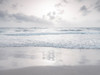 Tranquil beach with cloudscape by Assaf Frank (24 x 18)