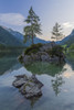Small rock island with trees on Lake Hintersee with mountains at dawn at Ramsau in the Berchtesgaden National Park in Upper Bavaria, Bavaria, Germany Poster Print by Raimund Linke (11 x 17)