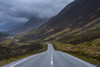 Storm clouds and typical Scottish country road through the highlands, Scotland, United Kingdom Poster Print by Raimund Linke (17 x 11)