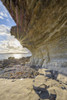 Close-up of rock face of sea cliff with honeycomb weathering and sun shining over Loch Scavaig on the Isle of Skye in Scotland, United Kingdom Poster Print by Raimund Linke (12 x 19)