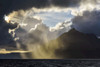 Sun breaking through the dramatic clouds along the Scottish coast over Loch Scavaig on the Isle of Skye in Scotland, United Kingdom Poster Print by Raimund Linke (17 x 11)