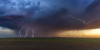 Lightning strikes from a weak airmass thunderstorm at sunset in the Texas Panhandle; Texas, United States of America Poster Print by Stuart Short (20 x 10)