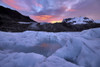 Frozen pool of water on the ice of the Gorner Glacier at sunrise.; Gornergrat, Zermatt, Switzerland. Poster Print by Robbie Shone (20 x 13)