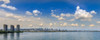 Montreal cityscape and St. Lawrence River viewed from Samuel De Champlain Bridge; Montreal, Quebec, Canada Poster Print by Alberto Biscaro (34 x 13)
