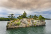 Small island in the Thousand Islands, a North American archipelago of 1,864 islands that straddles the Canada�US border in the Saint Lawrence River; Ontario, Canada Poster Print by Alberto Biscaro (20 x 13)