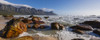 Rocky beach with Atlantic Ocean surf at Kogel Bay along the scenic R44 Route with the Kogelberg Mountains in the distance; Kogel Bay, Cape Town, Western Cape, South Africa Poster Print by Alberto Biscaro (34 x 13)