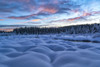 Snowy mounds and conifer forest with sunset illuminating the sky over McIntyre Creek in winter; White Horse, Yukon, Canada Poster Print by Robert Postma (18 x 12)