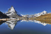 Matterhorn reflected in Lake Riffelsee, Zermatt, Alps, Valais, Switzerland Poster Print by Raimund Linke (19 x 12)