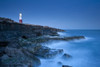 Portland Bill lighthouse illuminated at dusk. Poster Print by Jeremy Walker (17 x 11)