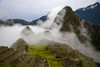 Cloud shrouded Machu Picchu; Machu Picchu, Peru Poster Print by Michael Melford (17 x 11)