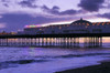 Brighton Palace Pier seen at sunset as dusk begins to fall. Poster Print by Loop Images Ltd. (17 x 11)