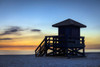 Lifeguard shack at sunset at Siesta Key Beach in Florida. Poster Print by Loop Images Ltd. (17 x 11)
