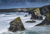 Rough sea conditions at Bedruthan Steps on the North Cornwall coast. Poster Print by Loop Images Ltd. (17 x 11)