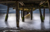 A long exposure underneath Southwold pier. Poster Print by Loop Images Ltd. (19 x 12)