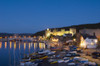 A view toward Conwy Castle at night. Poster Print by Loop Images Ltd. (17 x 11)