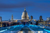 The Millennium footbridge and St Paul's Cathedral at night. Poster Print by Loop Images Ltd. (17 x 11)
