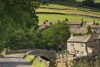 The small rural village of Thwaite in the Yorkshire Dales. Poster Print by Loop Images Ltd. (18 x 12)