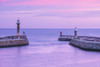 Dawn view of the entrance to Whitby harbour. Poster Print by Loop Images Ltd. (20 x 13)