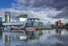 Salford Quays theatre seen across the basin. Poster Print by Loop Images Ltd. (18 x 12)