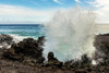 Close-up of the splashes of a breaking wave on lava rock on the shore of Maui, Hawaii, USA; Maui, Hawaii, United States of America Poster Print by Living Moments Media (20 x 13)